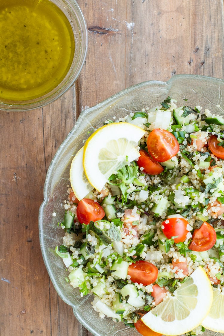 Tabbouleh salad in a glass bowl, close up.
