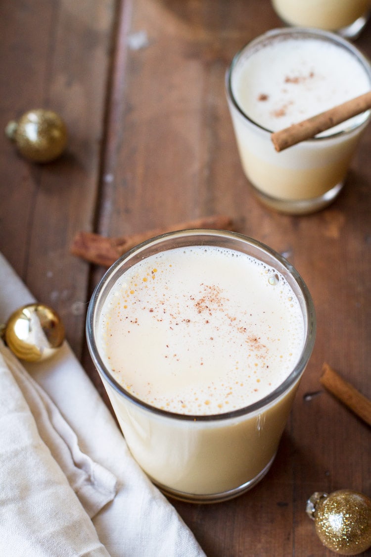 Homemade nog seen from an angle to show the foam on top.