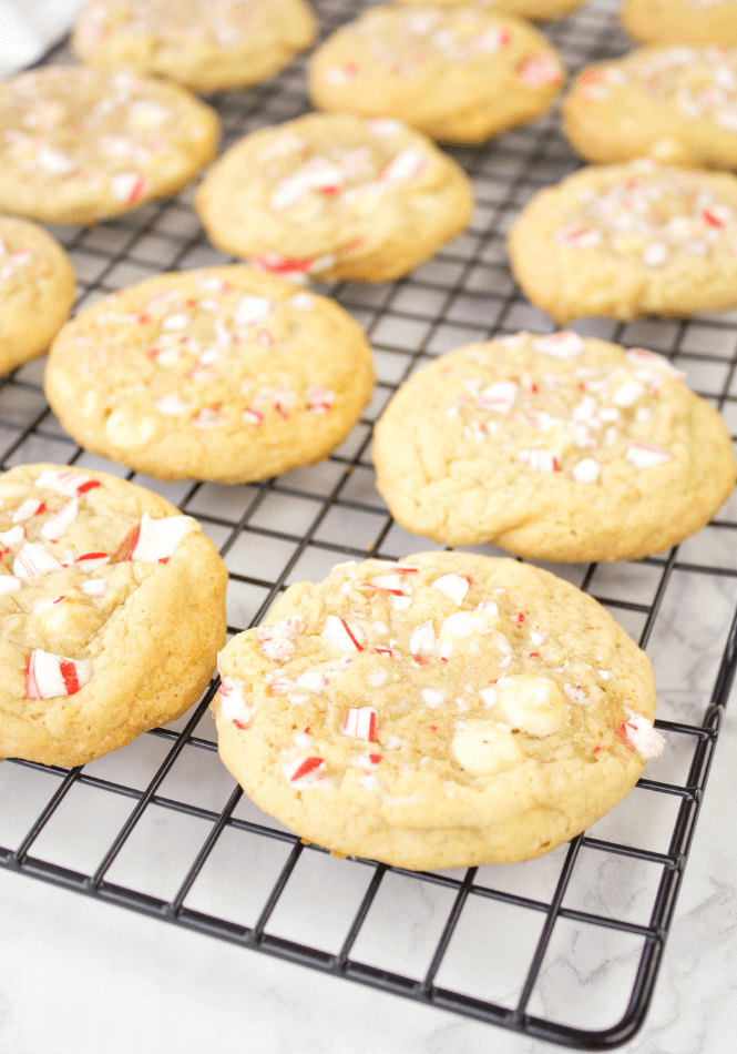 Cream colored cookies with candy cane flakes.