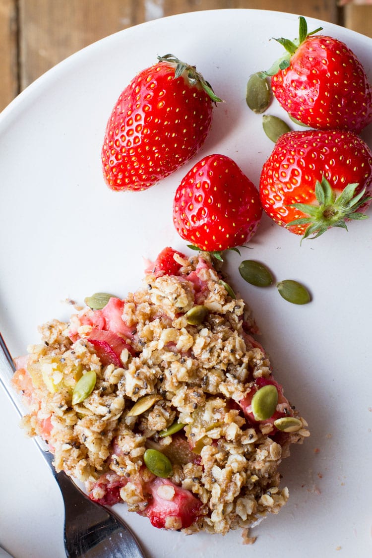Close-up of the oatmeal bar and some fresh strawberries.