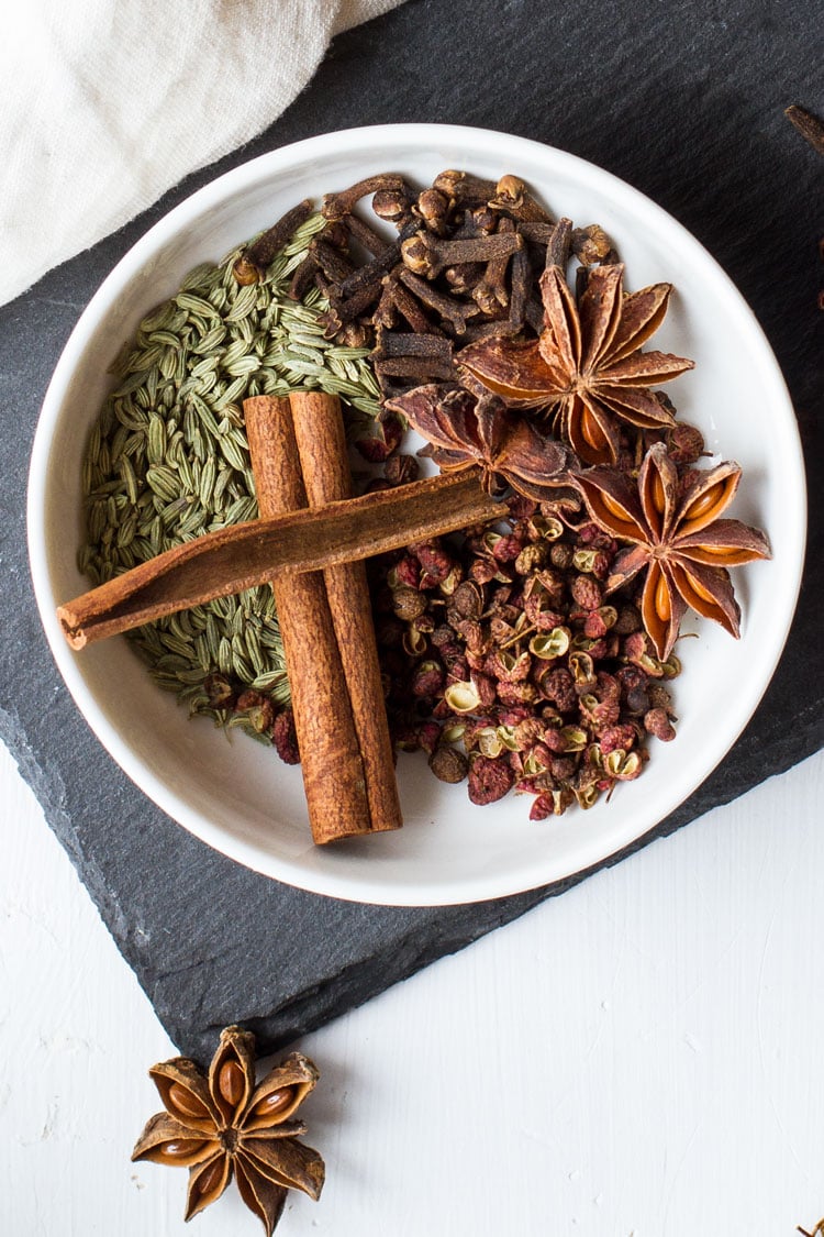 Whole spices to make Chinese Five Spice: cinnamon, cloves, star anise, fennel and Sichuan.