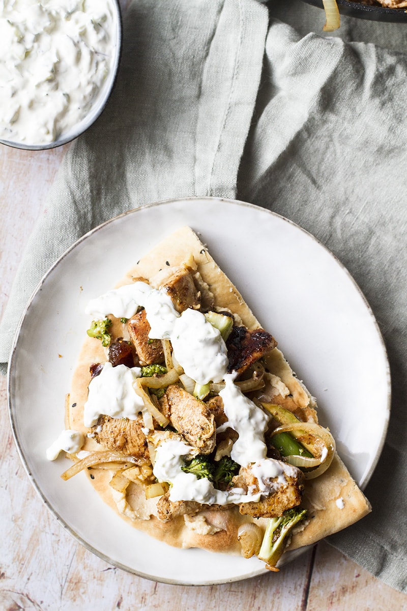 Shawarma chicken and vegetables on a naan. Flatlay.